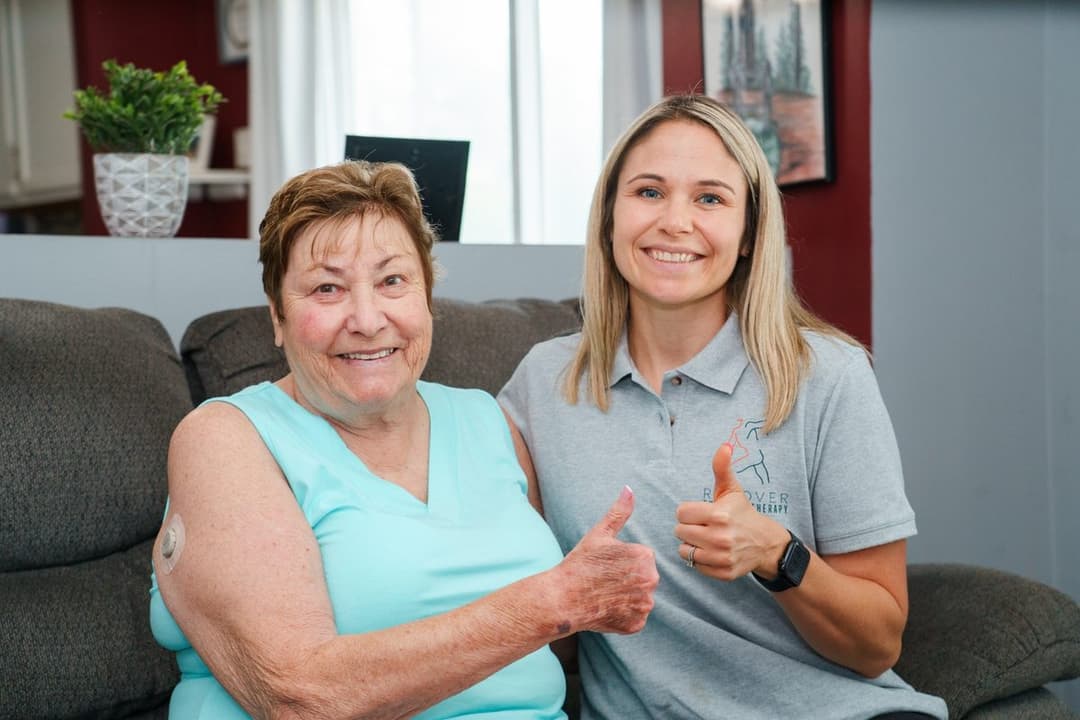 Happy Strong and Steady customer giving a thumbs up with Nicole.